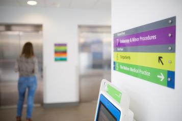 signs in a hospital corridor